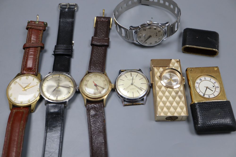 Five assorted wrist watches including Mondia, Ingersoll & Inventic and a travelling watch and a lighter watch.